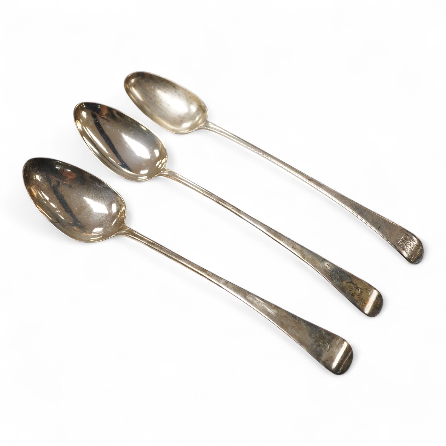 Three George III silver old English pattern basting spoons, William Fearn, London, 1776, Robert Gaze, London 1801 and Eley & Fearn London 1805, longest approx. 29.5cm, 9.9oz.